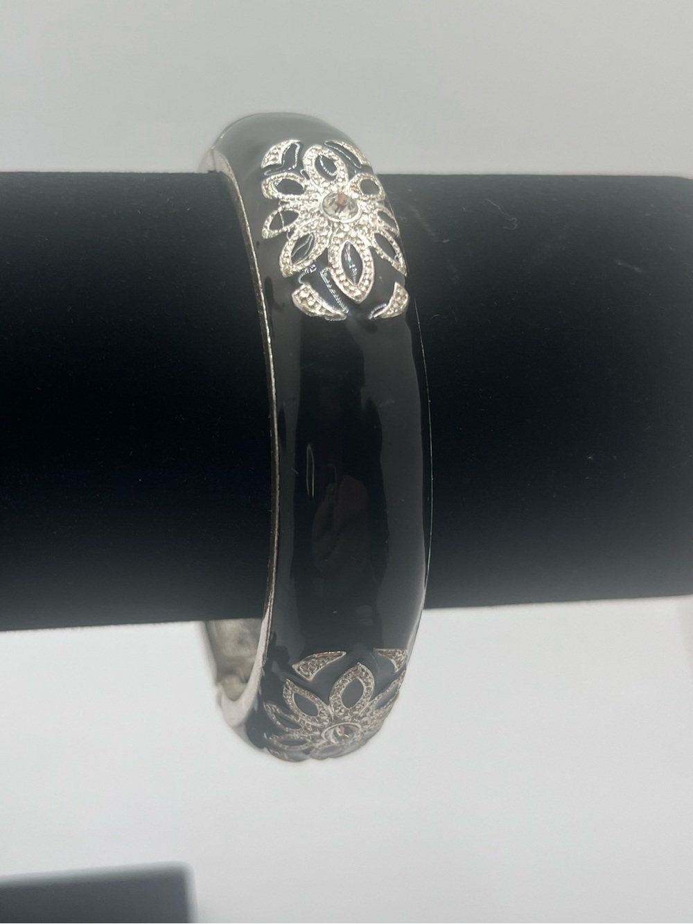 Black enamel hinged bangle bracelet silver tone floral rhinestone accents